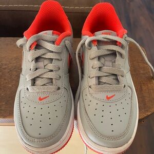 Nike Gray and Red Sneakers with Classic Air Force 1 Design